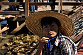 Inle Lake Myanmar. All the buildings are constructed on piles. Residents travel around by canoe, but there are also bamboo walkways and bridges over the canals, monasteries and stupas. 